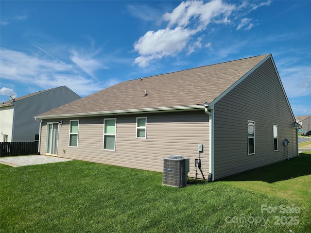 1195 Winding Creek Rd, Salisbury, NC 28146 - back of property with central AC, a patio area, and roof with shingles