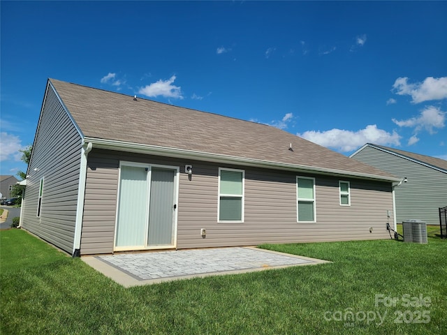 1195 Winding Creek Rd, Salisbury, NC 28146 - back of property featuring central air condition unit, a lawn, a patio, and roof with shingles