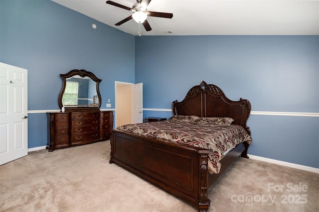4201 Amber Leigh Way Dr, Charlotte, NC 28269 - carpeted bedroom with high vaulted ceiling and ceiling fan