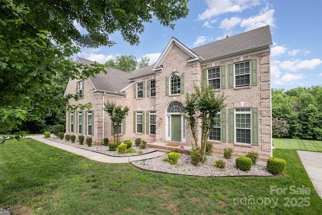 4201 Amber Leigh Way Dr, Charlotte, NC 28269 - colonial inspired home featuring a front lawn, brick siding, and a shingled roof