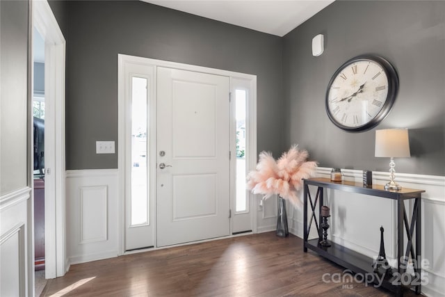 3212 Gilroy Dr, Fort Mill, SC 29707 - foyer featuring wainscoting, wood finished floors, and a decorative wall