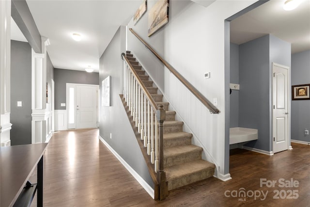 3212 Gilroy Dr, Fort Mill, SC 29707 - entryway with dark wood-style floors, stairs, and decorative columns