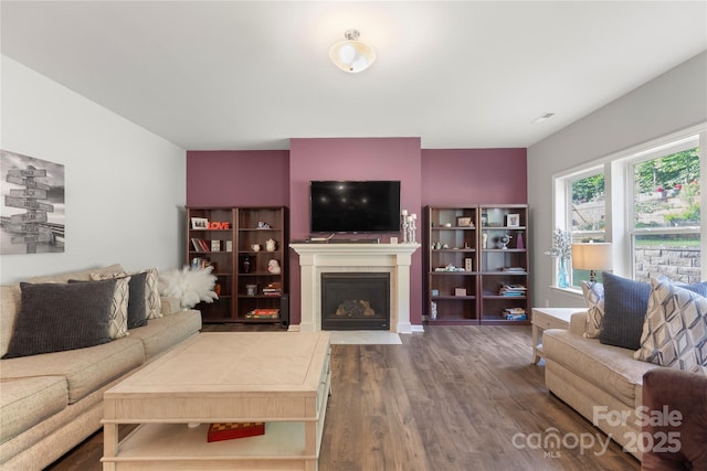 3212 Gilroy Dr, Fort Mill, SC 29707 - living area with wood finished floors and a fireplace with flush hearth