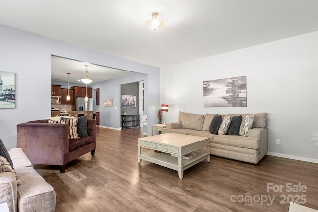 3212 Gilroy Dr, Fort Mill, SC 29707 - living area with wood finished floors and baseboards