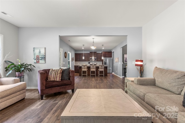 3212 Gilroy Dr, Fort Mill, SC 29707 - living room with dark wood-style flooring and baseboards