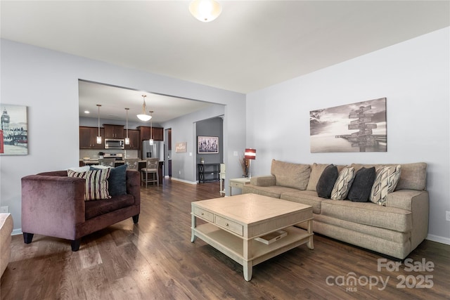3212 Gilroy Dr, Fort Mill, SC 29707 - living area featuring dark wood-type flooring and baseboards