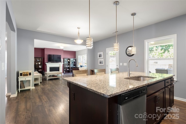 3212 Gilroy Dr, Fort Mill, SC 29707 - kitchen featuring dishwasher, dark wood-style flooring, healthy amount of natural light, and light stone counters