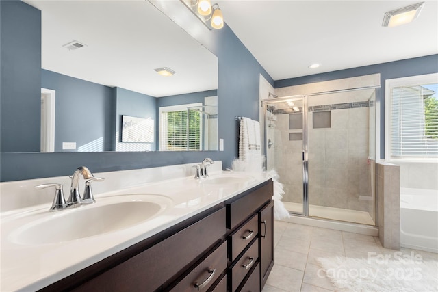 3212 Gilroy Dr, Fort Mill, SC 29707 - bathroom featuring a bath, double vanity, tile patterned floors, and a shower stall