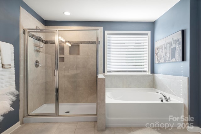 3212 Gilroy Dr, Fort Mill, SC 29707 - bathroom with tile patterned floors, a garden tub, and a stall shower