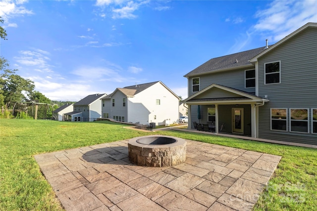 3212 Gilroy Dr, Fort Mill, SC 29707 - view of patio featuring a fire pit and a residential view