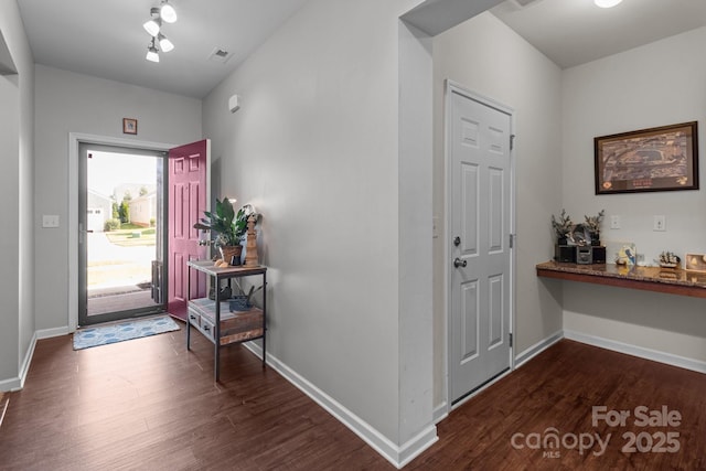 185 Willow Valley Dr, Mooresville, NC 28115 - entryway featuring dark wood-type flooring and baseboards