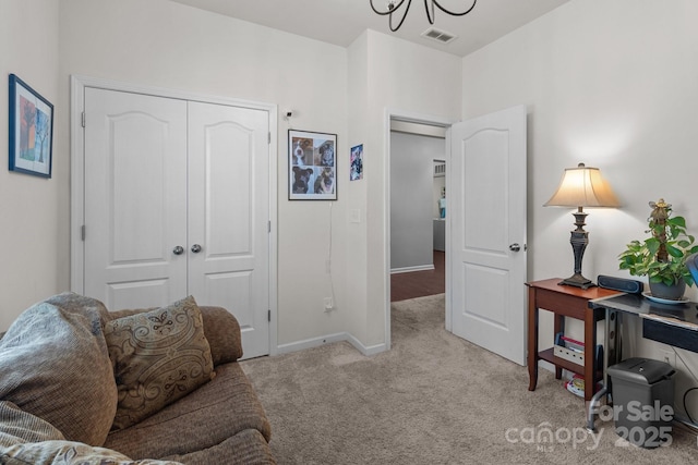 185 Willow Valley Dr, Mooresville, NC 28115 - sitting room with light carpet, a chandelier, and baseboards