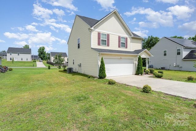 635 Scarlet Leaf Ln, Oakboro, NC 28129 - view of front of house with board and batten siding, a garage, concrete driveway, and a front yard