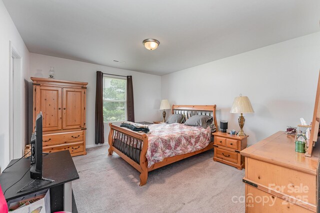 635 Scarlet Leaf Ln, Oakboro, NC 28129 - bedroom with light colored carpet