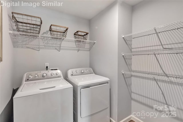 10127 Florentine Way, Charlotte, NC 28214 - laundry room featuring washer and dryer and baseboards