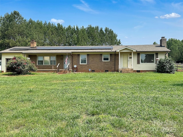 305 Rockdale Rd, Lawndale, NC 28090 - ranch-style house featuring a chimney, crawl space, roof mounted solar panels, and entry steps
