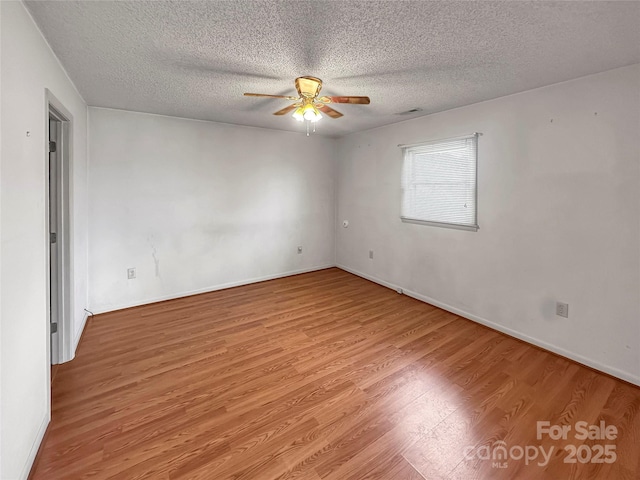 305 Rockdale Rd, Lawndale, NC 28090 - spare room with light wood-type flooring, ceiling fan, and a textured ceiling