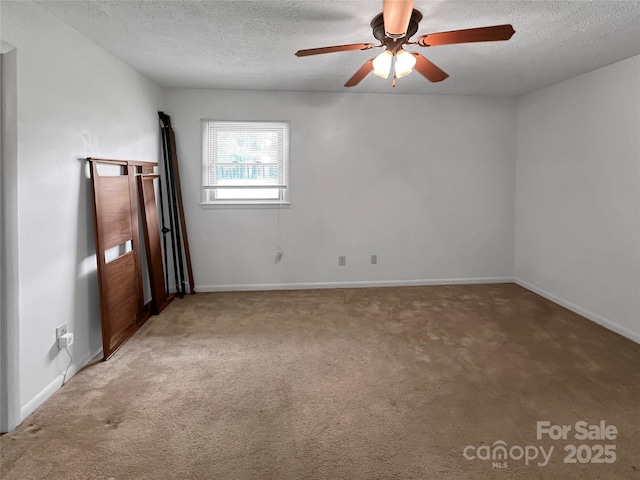 305 Rockdale Rd, Lawndale, NC 28090 - carpeted spare room featuring a textured ceiling and ceiling fan