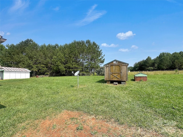 305 Rockdale Rd, Lawndale, NC 28090 - view of green lawn featuring a storage shed