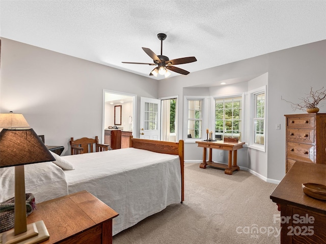 306 Croydon Dr, Hendersonville, NC 28791 - carpeted bedroom featuring baseboards, a textured ceiling, and a ceiling fan