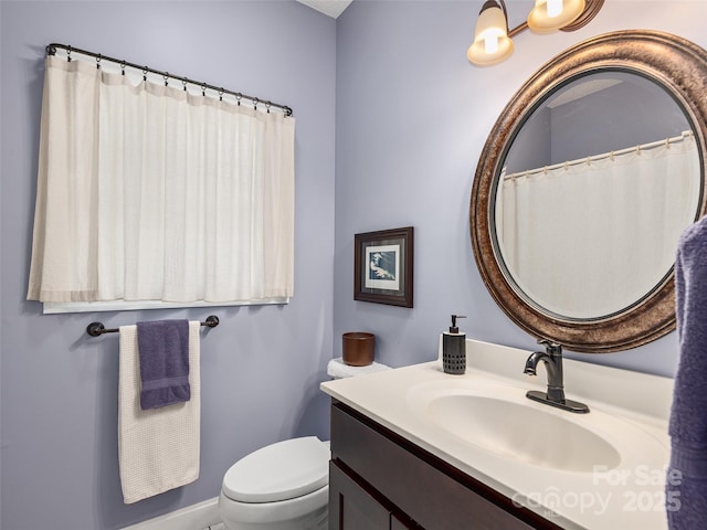 306 Croydon Dr, Hendersonville, NC 28791 - bathroom featuring vanity, toilet, and baseboards