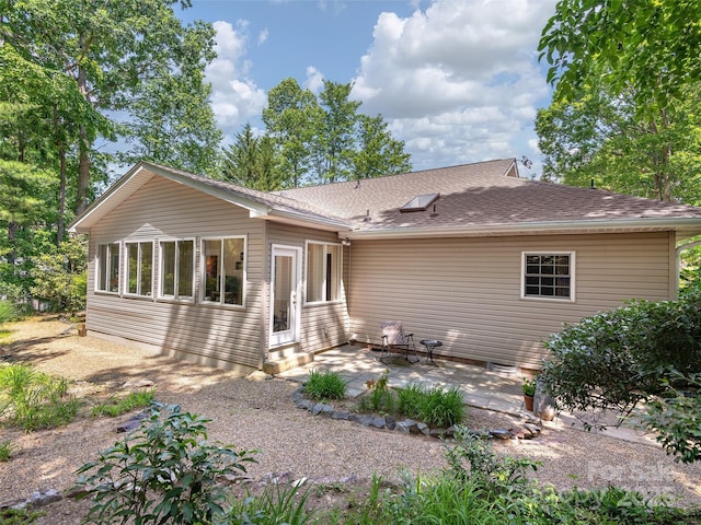 306 Croydon Dr, Hendersonville, NC 28791 - rear view of property featuring a patio, entry steps, and roof with shingles
