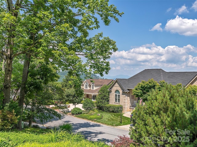 306 Croydon Dr, Hendersonville, NC 28791 - view of front of house featuring a shingled roof and brick siding
