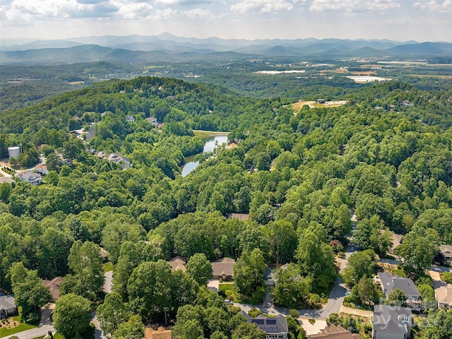 306 Croydon Dr, Hendersonville, NC 28791 - drone / aerial view of a heavily wooded area and a water and mountain view