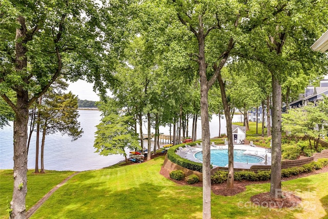 303 NW Dr, Davidson, NC 28036 - view of green lawn featuring a water view and a community pool