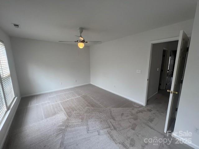 12378 Swan Wings Pl, Huntersville, NC 28078 - empty room featuring ceiling fan, carpet, and baseboards