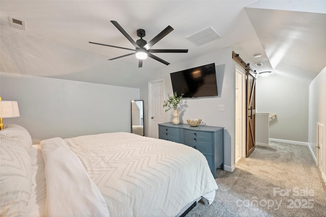 1925 Sandal Brook Rd, Indian Land, SC 29707 - bedroom with a barn door, vaulted ceiling, light carpet, a ceiling fan, and baseboards