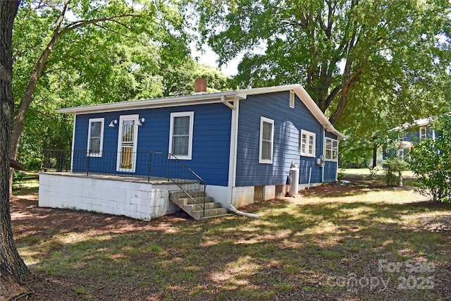 2131 E NC-10 Hwy, Conover, NC 28613 - view of side of home with a chimney