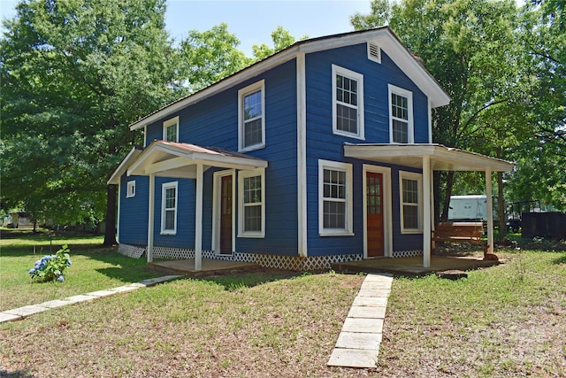 2131 E NC-10 Hwy, Conover, NC 28613 - view of front facade with covered porch and a front lawn