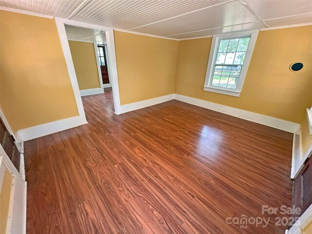 2131 E NC-10 Hwy, Conover, NC 28613 - empty room with ornamental molding, baseboards, and wood finished floors