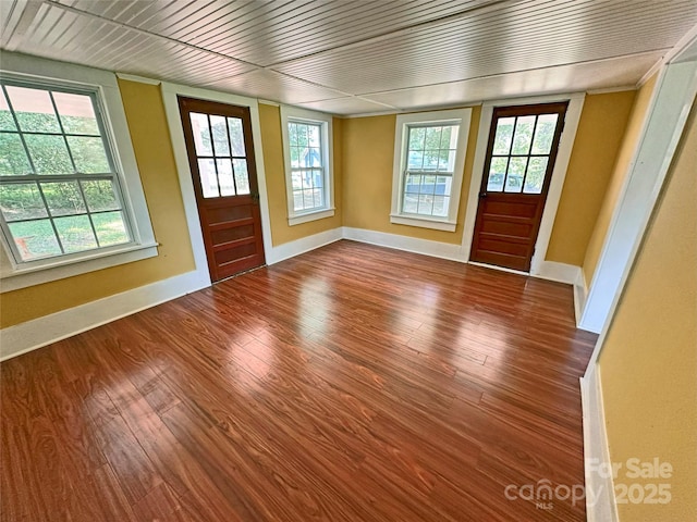 2131 E NC-10 Hwy, Conover, NC 28613 - entryway with wood finished floors, baseboards, healthy amount of natural light, and wood ceiling