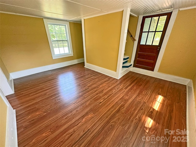 2131 E NC-10 Hwy, Conover, NC 28613 - empty room with wood finished floors, stairway, baseboards, and crown molding