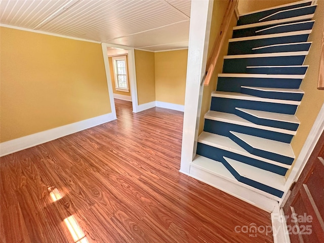 2131 E NC-10 Hwy, Conover, NC 28613 - stairway featuring wood finished floors, baseboards, and crown molding