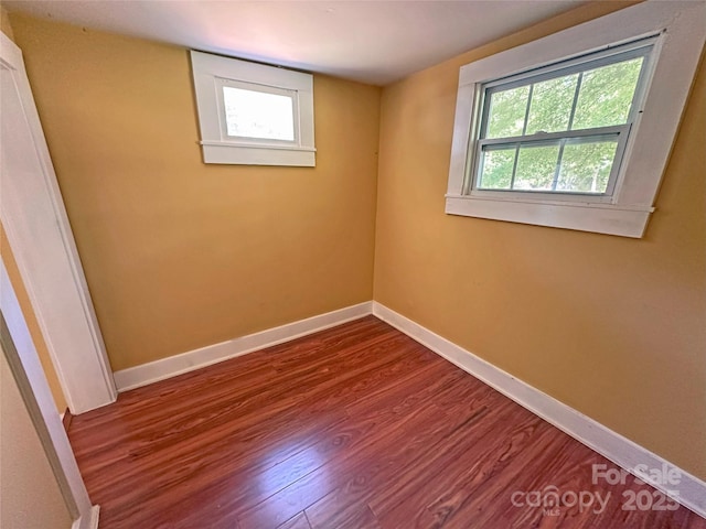 2131 E NC-10 Hwy, Conover, NC 28613 - unfurnished room with baseboards and wood finished floors