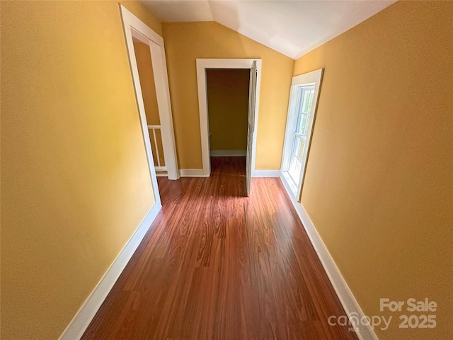 2131 E NC-10 Hwy, Conover, NC 28613 - corridor with dark wood-type flooring, lofted ceiling, and baseboards