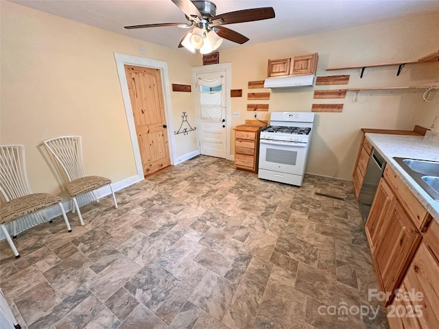 2131 E NC-10 Hwy, Conover, NC 28613 - kitchen featuring white gas range oven, under cabinet range hood, dishwasher, and stone finish flooring