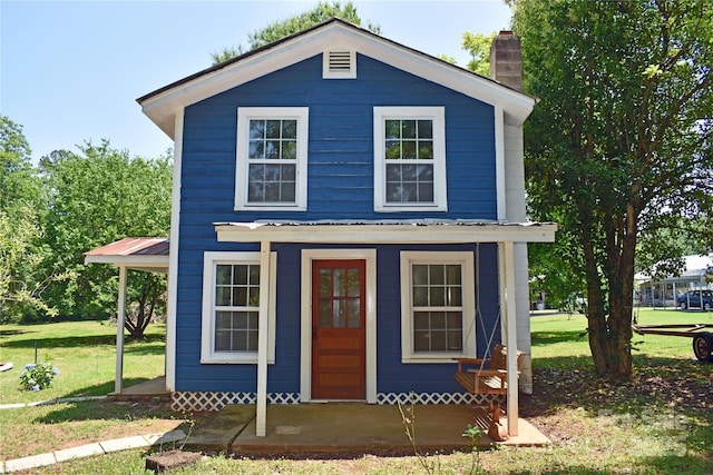 2131 E NC-10 Hwy, Conover, NC 28613 - view of front of house with a chimney and a front yard