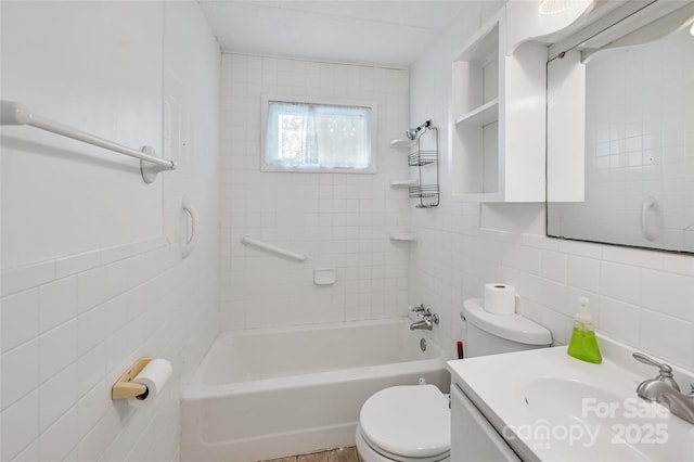 121 Walnut Holler Dr, Waynesville, NC 28786 - bathroom featuring tile walls, toilet, vanity, and shower / washtub combination