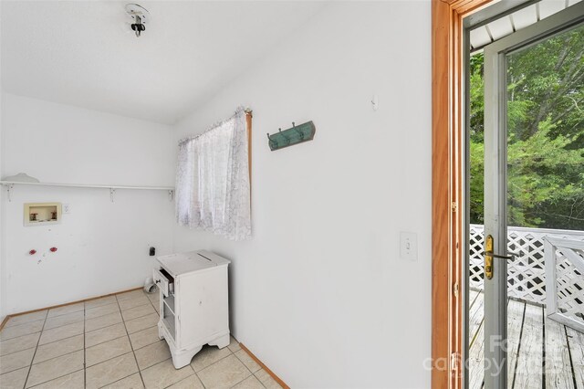121 Walnut Holler Dr, Waynesville, NC 28786 - laundry area featuring light tile patterned floors, washer hookup, and hookup for an electric dryer