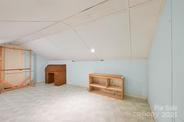 121 Walnut Holler Dr, Waynesville, NC 28786 - additional living space with lofted ceiling and tile patterned floors