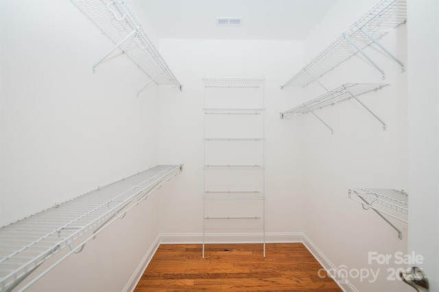 4518 Courtyard Blvd Unit 4, Harrisburg, NC 28075 - walk in closet featuring wood finished floors