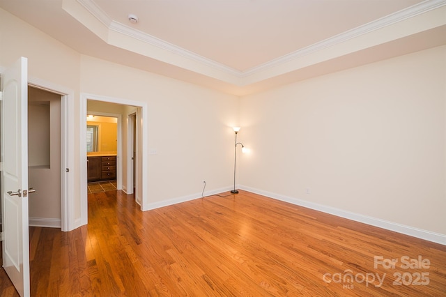 4518 Courtyard Blvd Unit 4, Harrisburg, NC 28075 - spare room with a smoke detector, crown molding, and wood finished floors