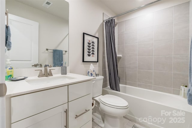 819 Anderson St, Charlotte, NC 28205 - bathroom with toilet, vanity, and shower / bath combo with shower curtain