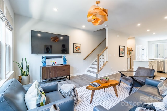 819 Anderson St, Charlotte, NC 28205 - living room featuring light wood-type flooring, stairway, recessed lighting, and baseboards
