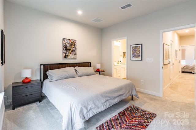819 Anderson St, Charlotte, NC 28205 - bedroom featuring light colored carpet, baseboards, recessed lighting, and connected bathroom