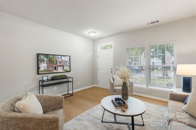 10225 Alexander Martin Ave, Charlotte, NC 28277 - living area featuring wood finished floors and baseboards